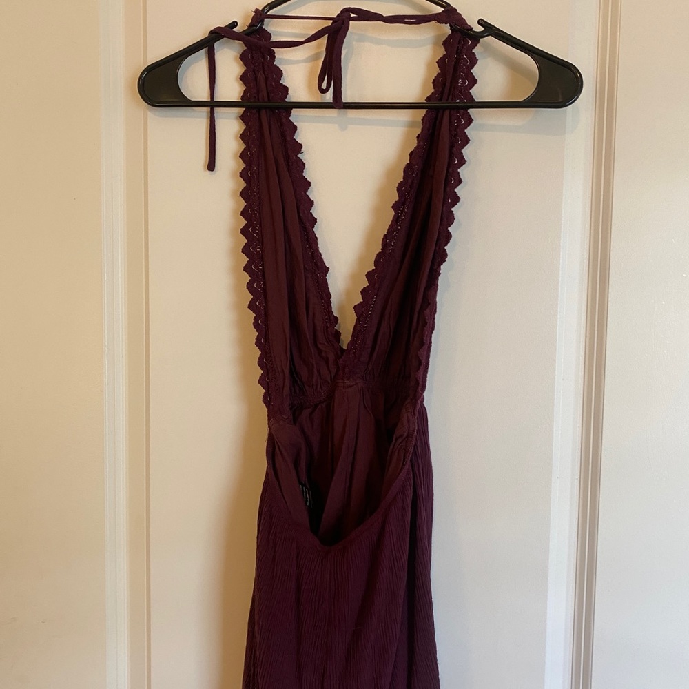 Backless v neck garnet romper with lace trim